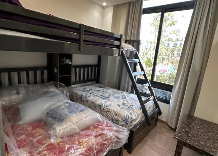 Dağ evi شالية فندقي للإيجار في سكاي ستي 4 الجلالة السخنة ارضي بحديقة مطل على بحيرة صناعية عذبة كبيرة اعلى منطقة في جبال الجلالة Ain Sukhna